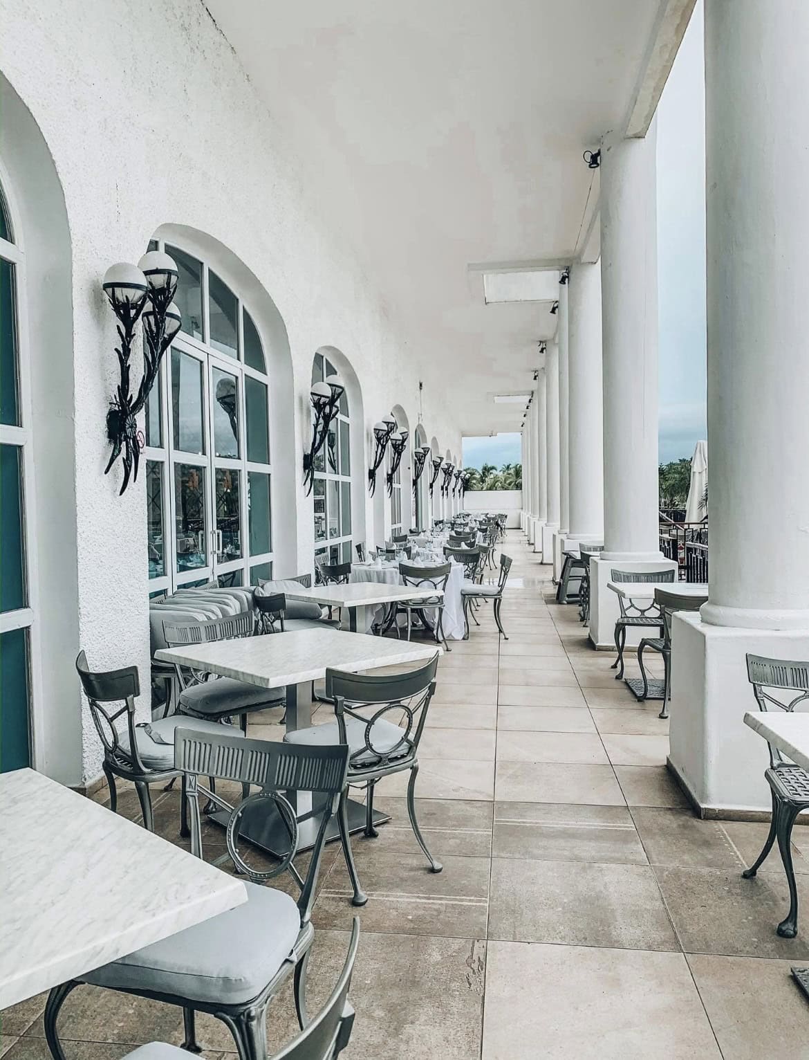Tables and chairs at an outside restaurant