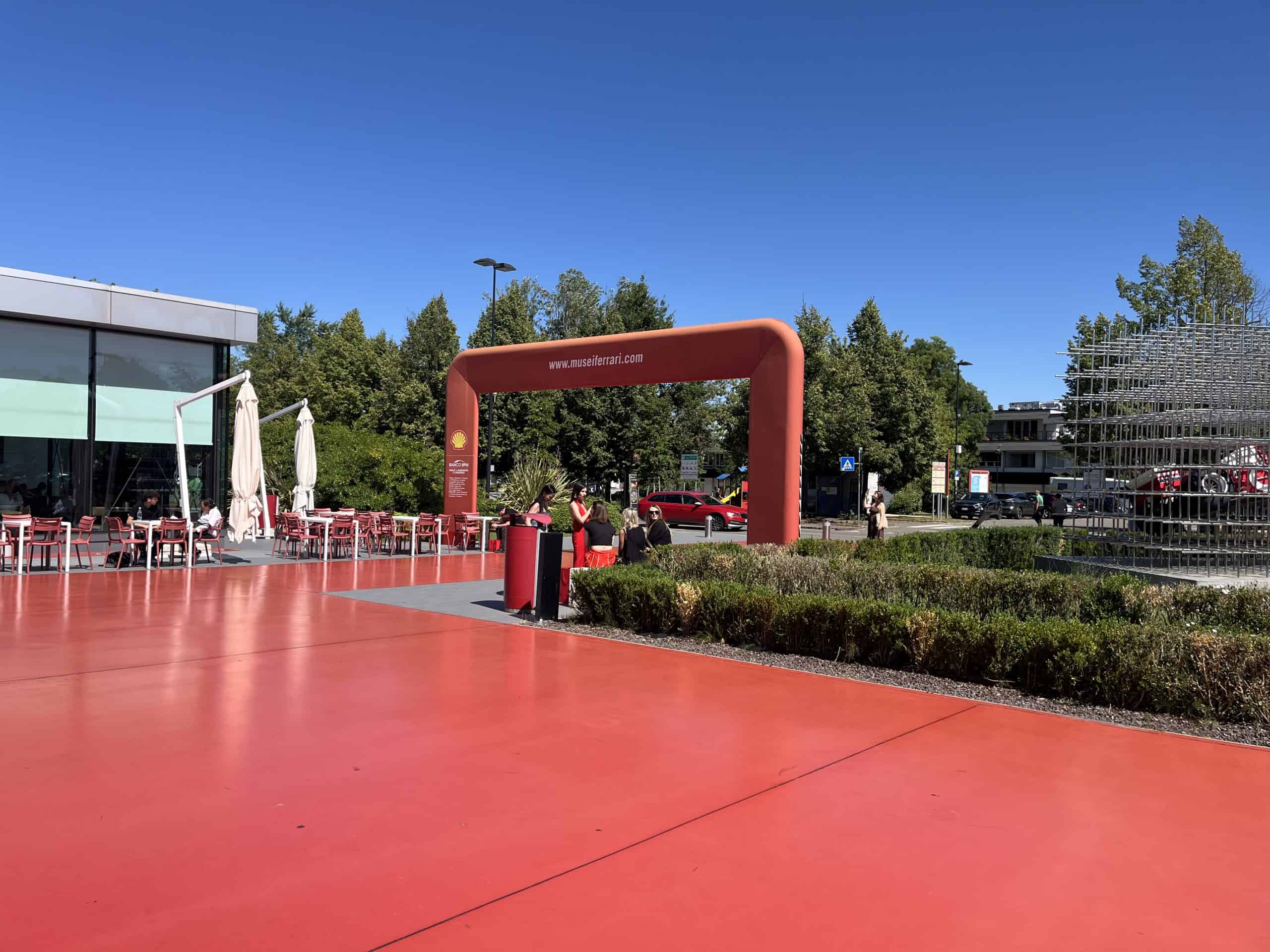 museum entrance with outdoor seating and vibrant surroundings.