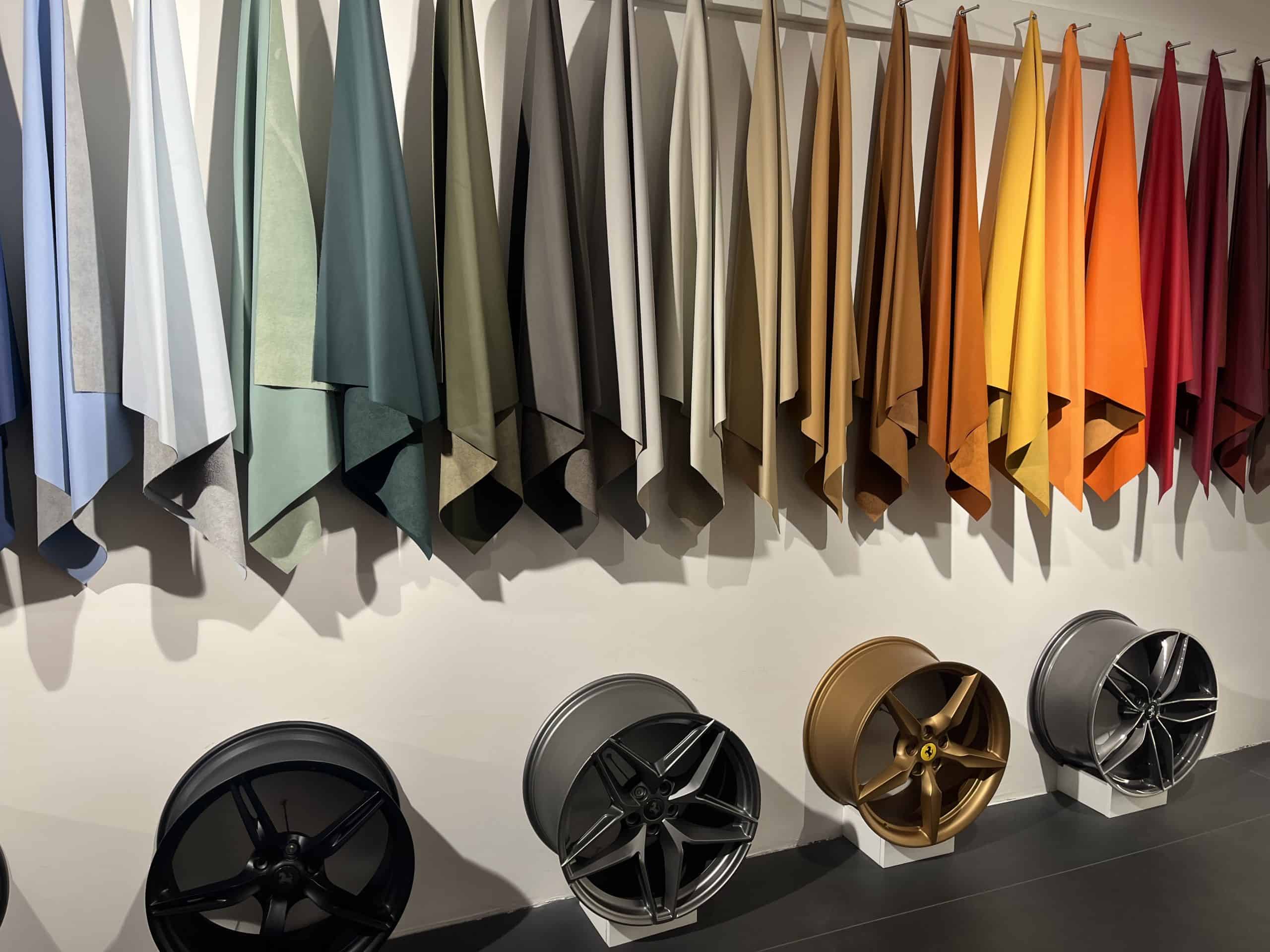 Fabric samples and wheel rims at Ferrari museum