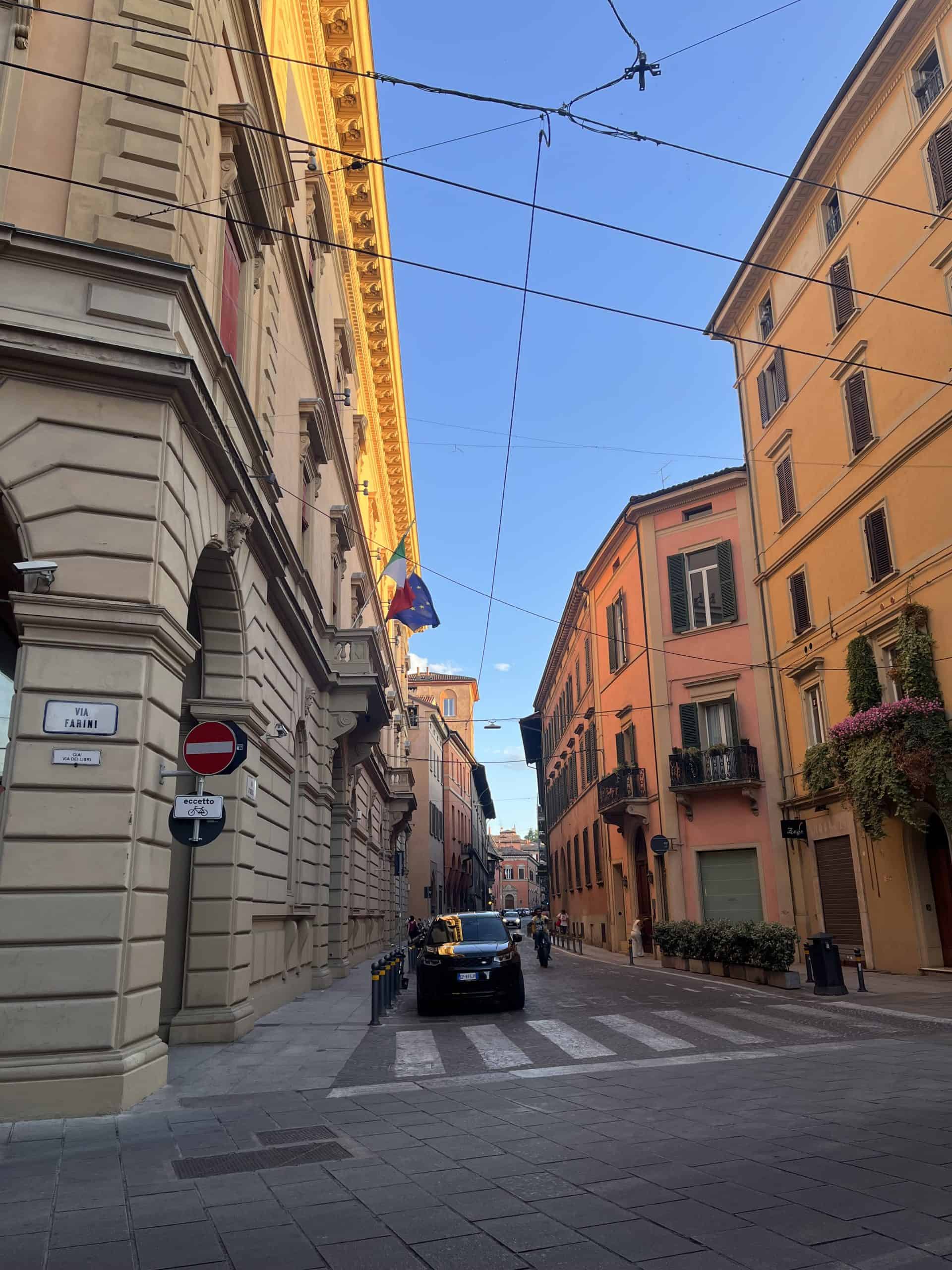 Side street with cars parked in Bologna