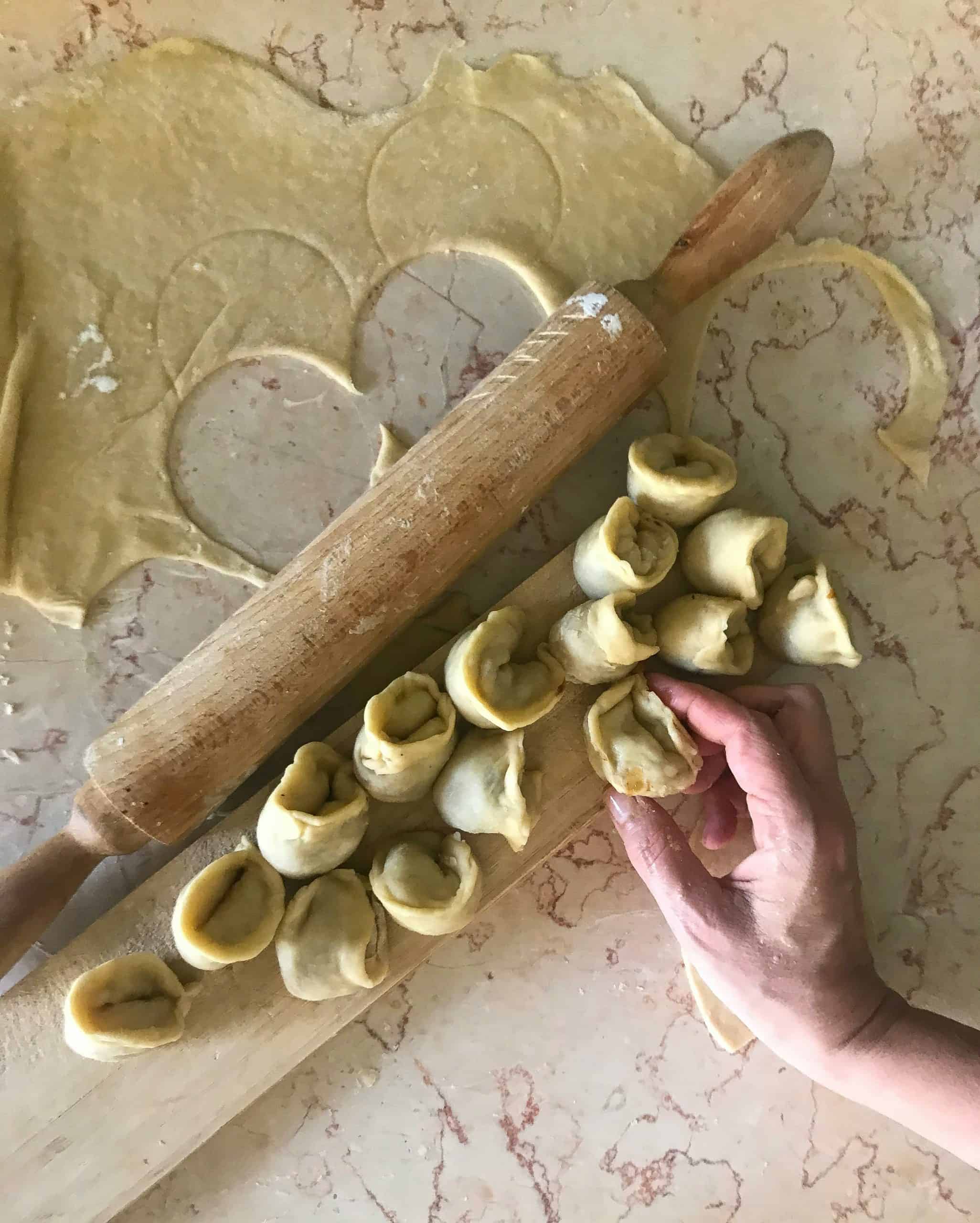 Making tortellini with a rolling pin