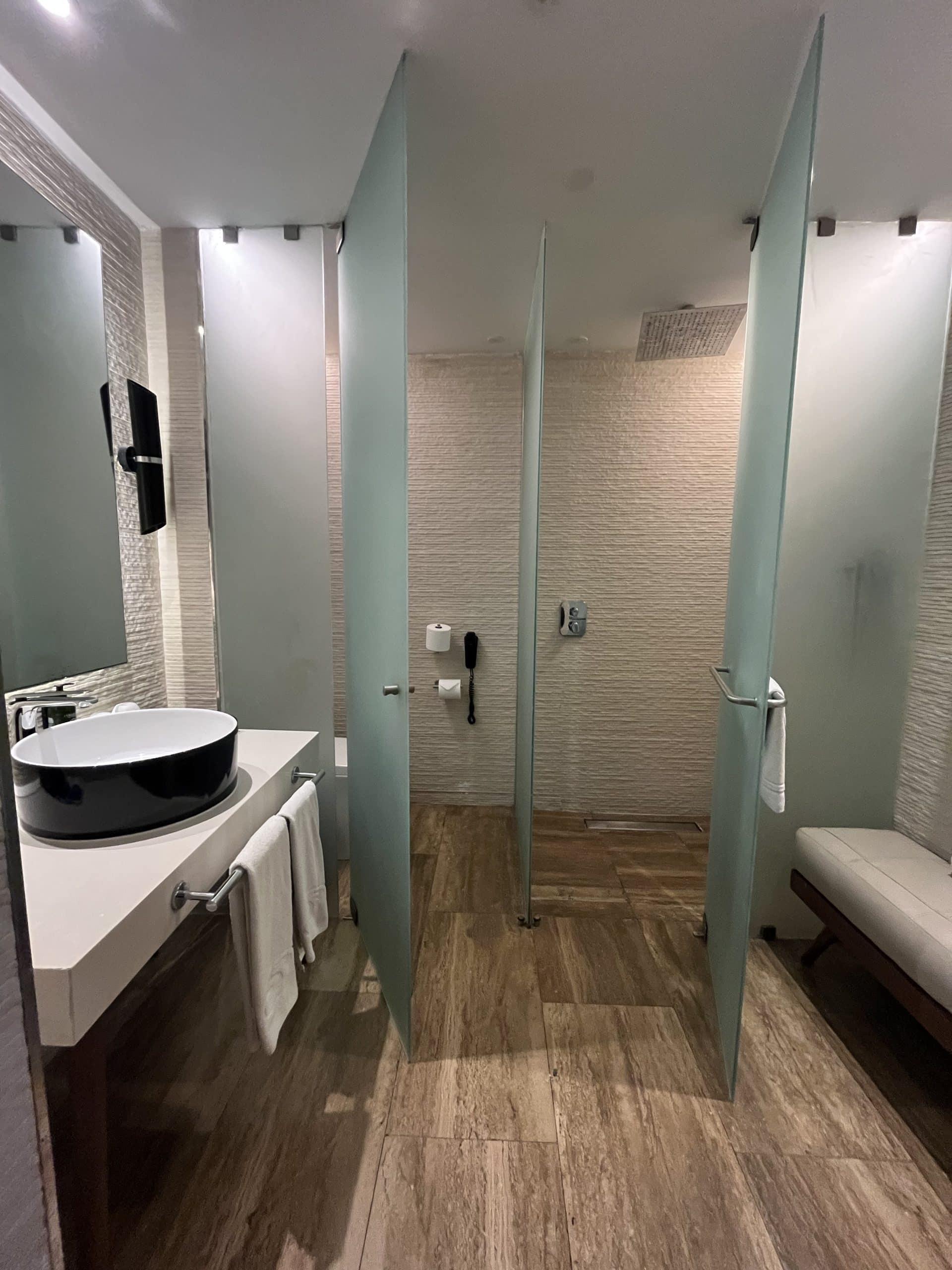 Bathroom with sink and shower stall