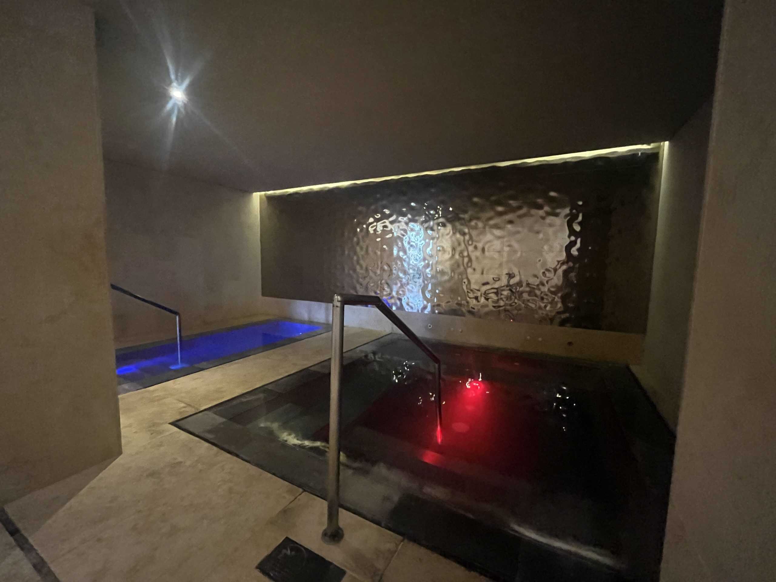 indoor plunge pools with blue and red lights
