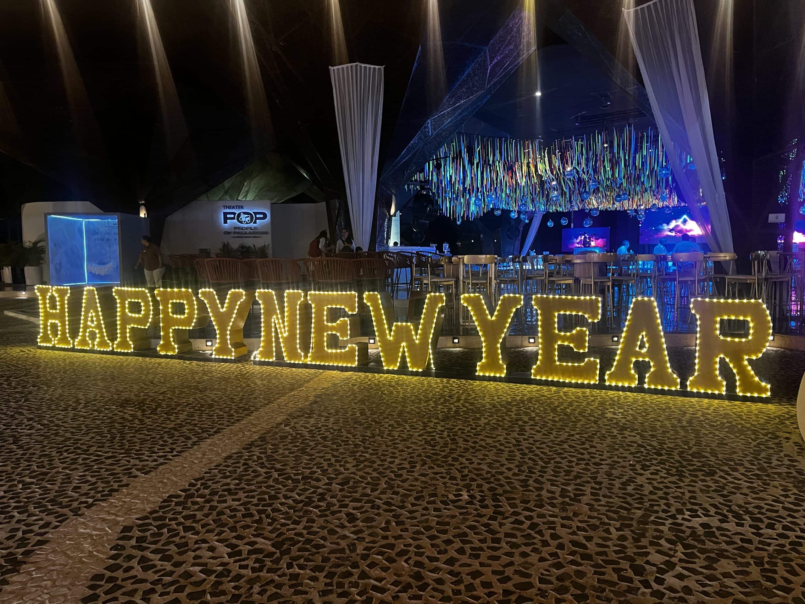 New Years Eve sign in yellow lights