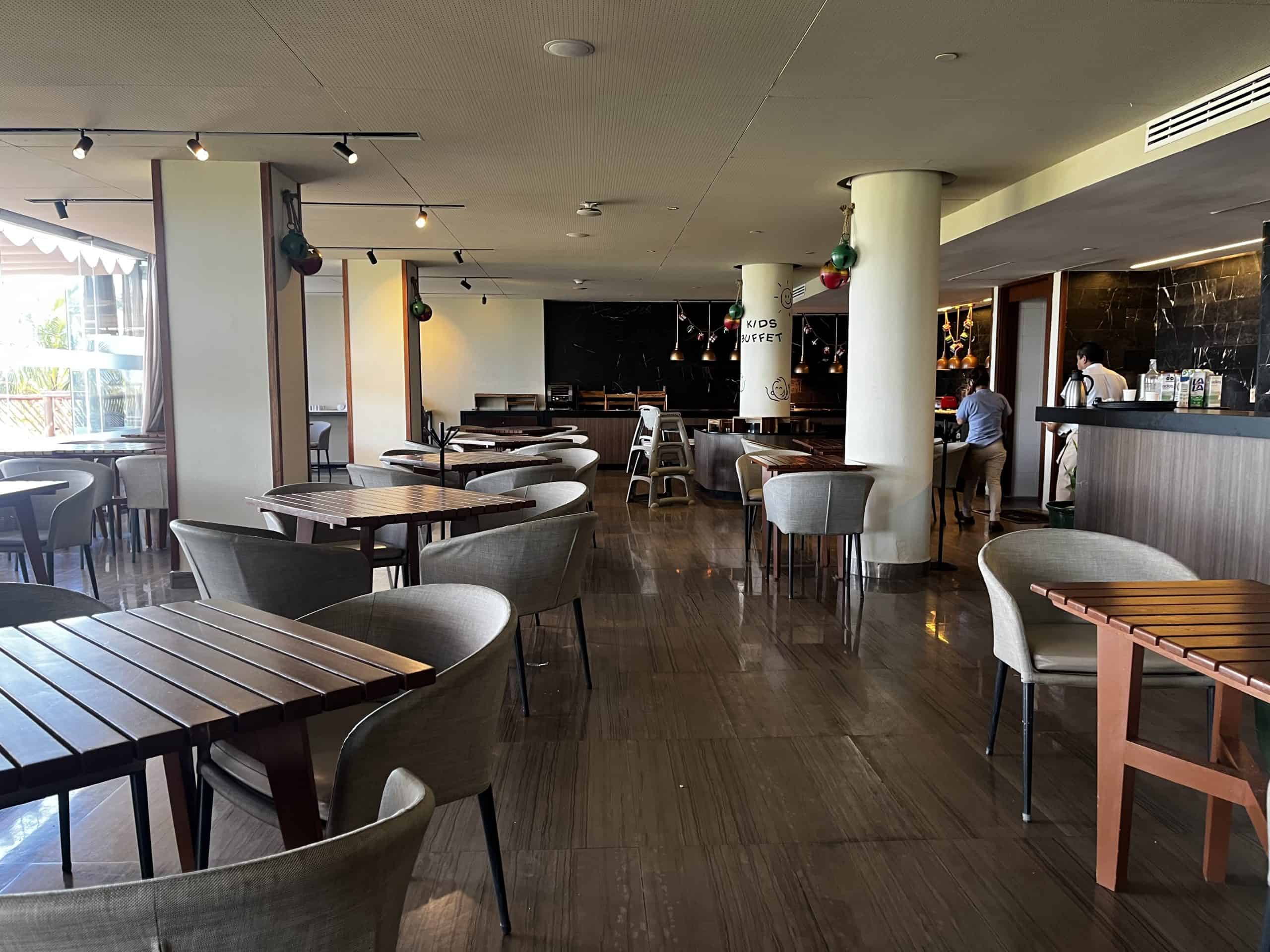 Hotel dining room with tables and chairs