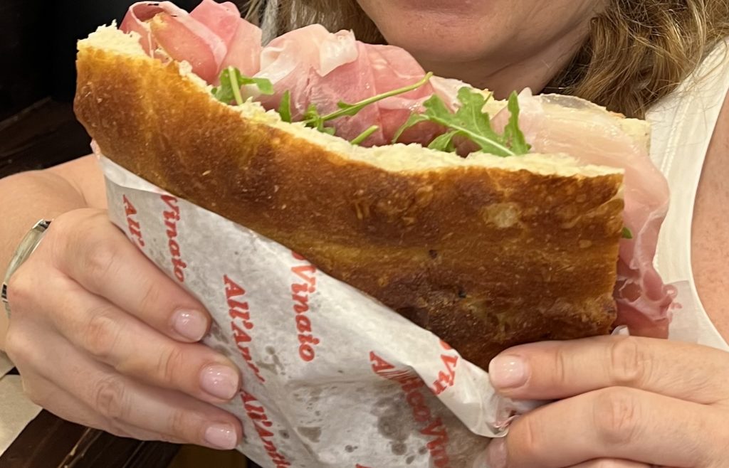 Panini sandwich with cold cuts and lettuce