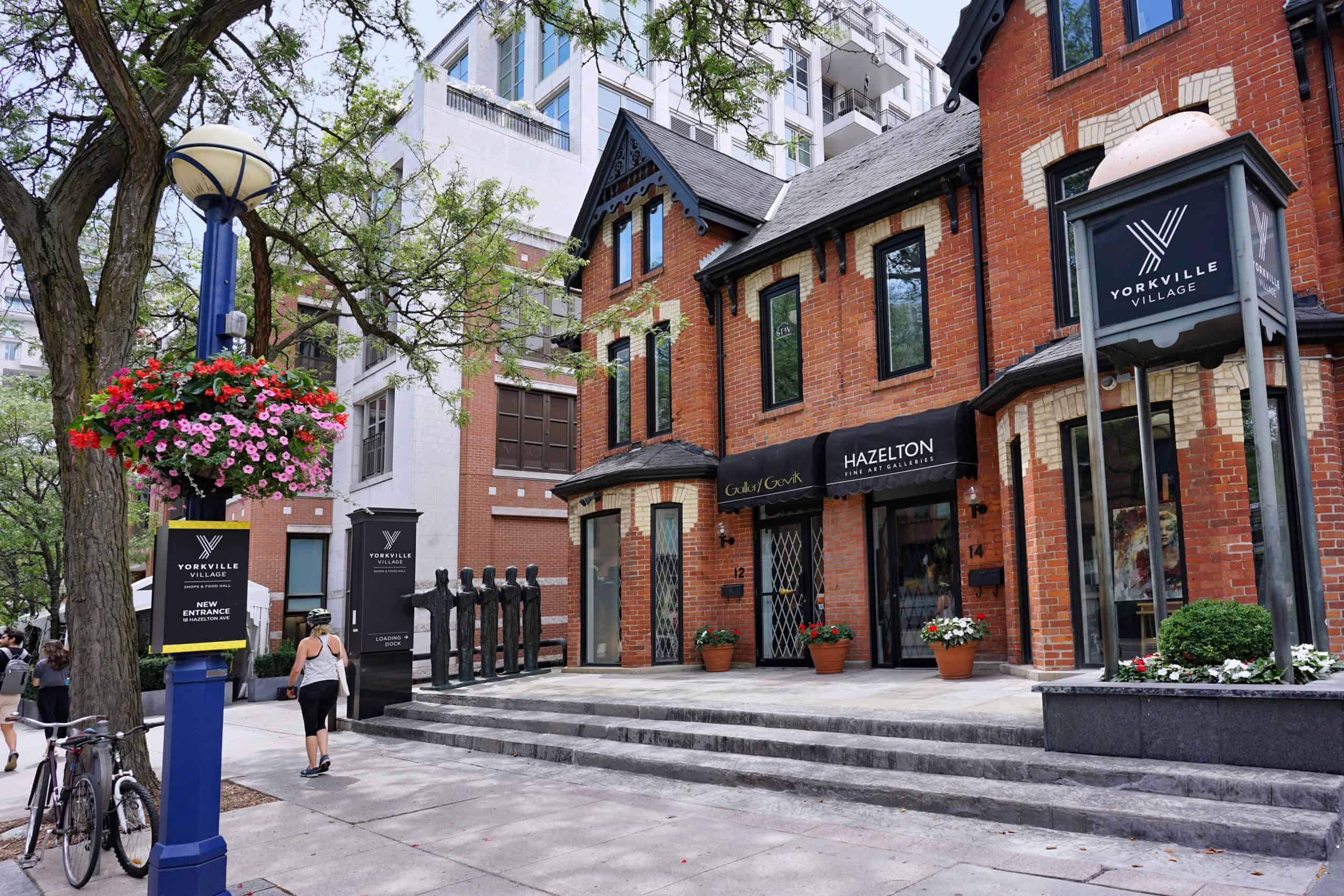 a row of old Victorian homes turned into boutiques