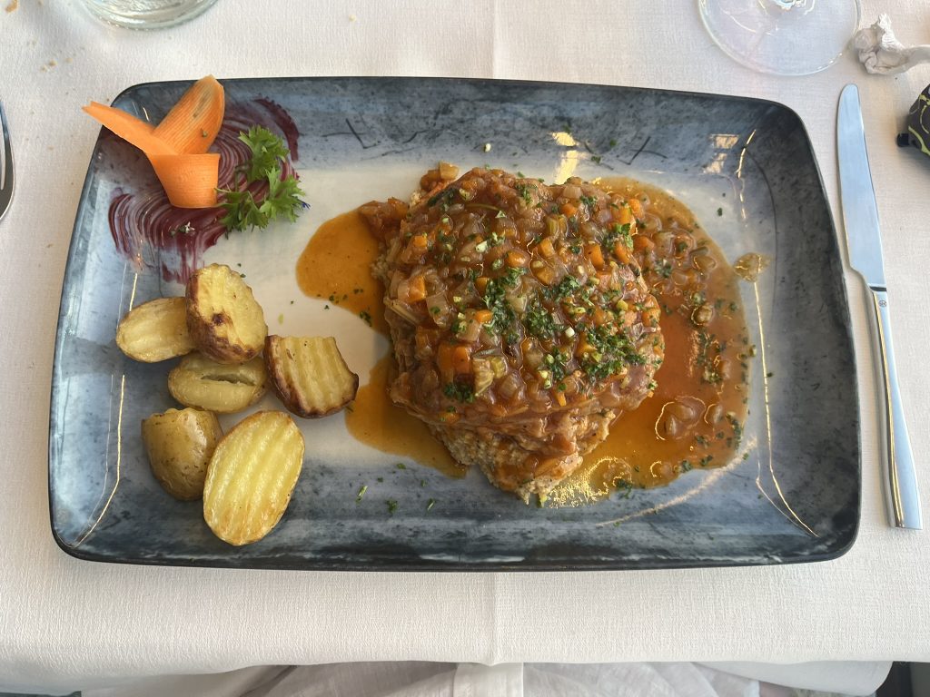 Plate of meat with potatoes