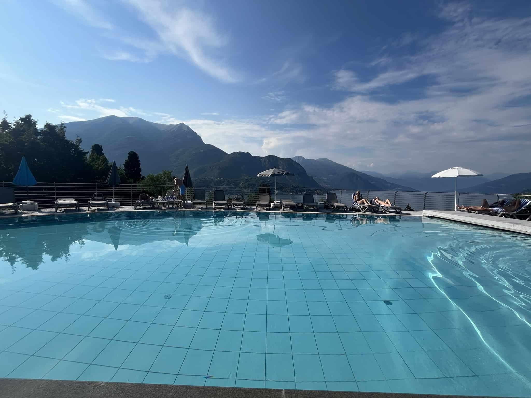 swimming pool with mountain in the background