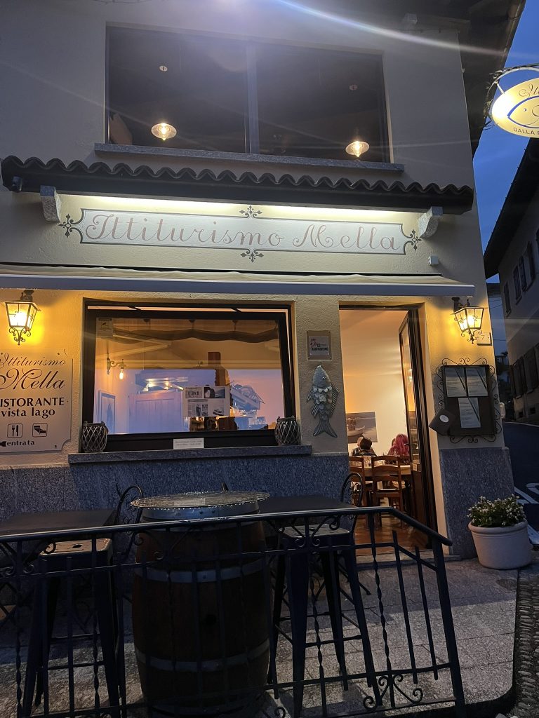 Sign that says Mella above a restaurant in San Giovanni
